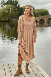 Model Tegan wearing size 10 of the Through The Fields Dress in colour Dust, from the front, showing the whole outfit