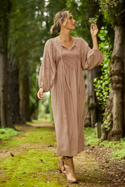 Model Tegan wearing size 10 of the Through The Fields Dress in colour Dust, from the front, showing the whole outfit
