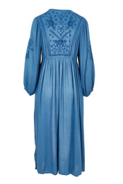 Product shot of the Through The Fields Dress in colour Ocean (Blue), from the back