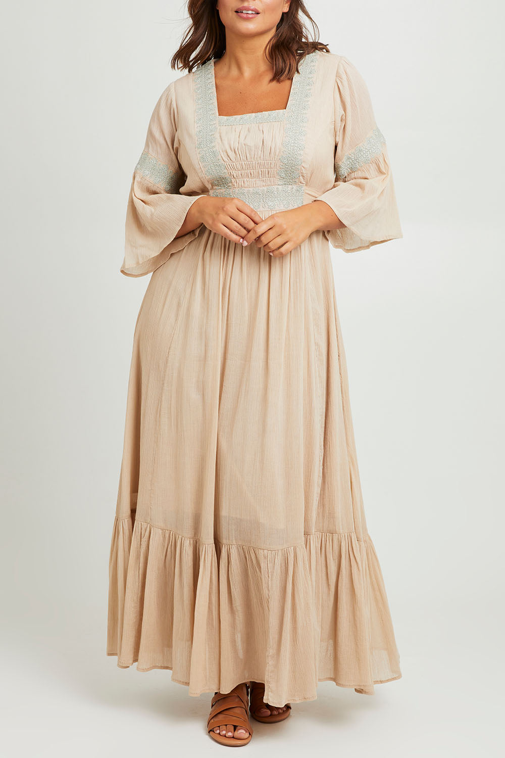 Model Monique wearing size 14 of the Perfect As You Are Maxi Dress in colour Sand, from the front, cropped image