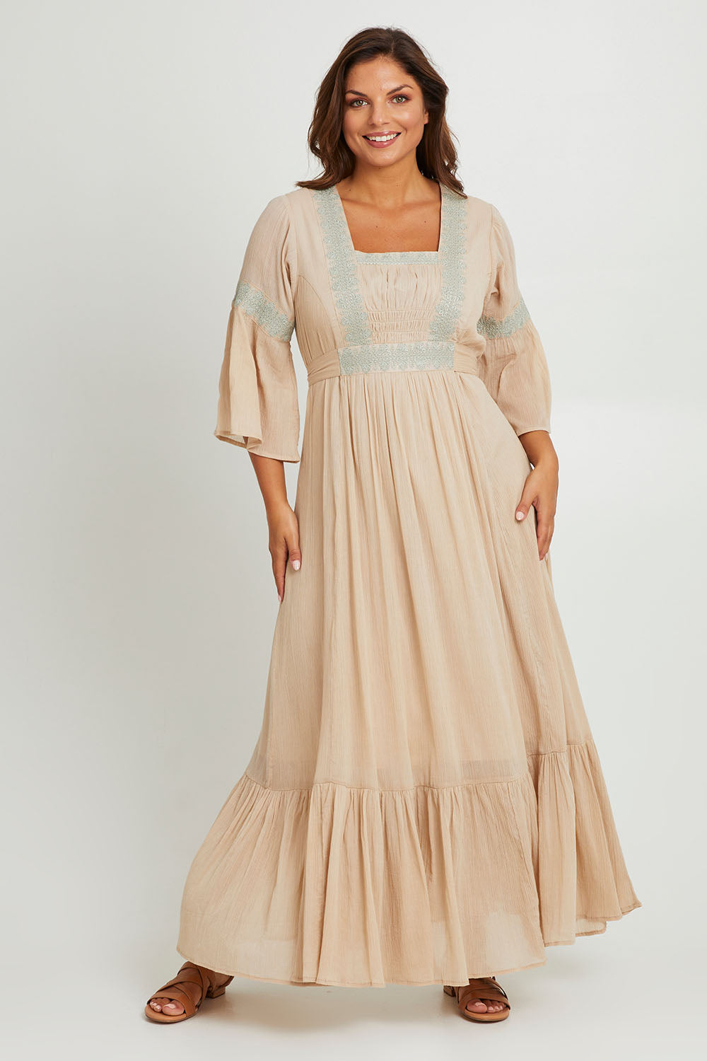Model Monique wearing size 14 of the Perfect As You Are Maxi Dress in colour Sand, from the front, showing the whole outfit