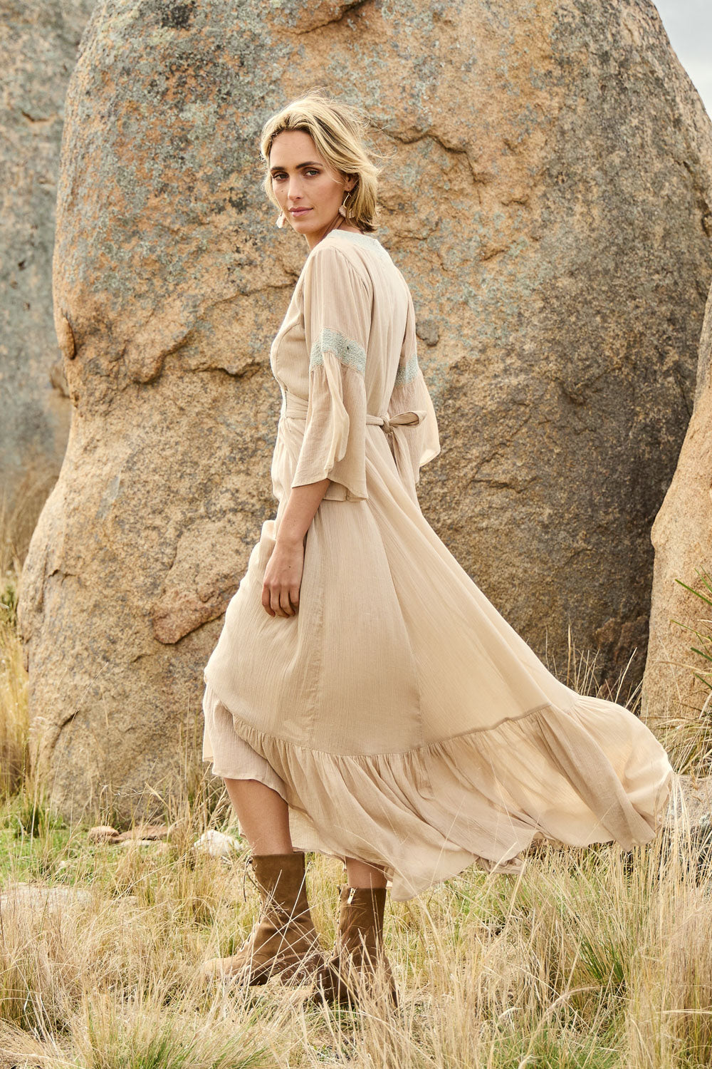 Model Tegan wearing size 10 of the Perfect As You Are Maxi Dress in colour Sand, from the front, showing the whole outfit