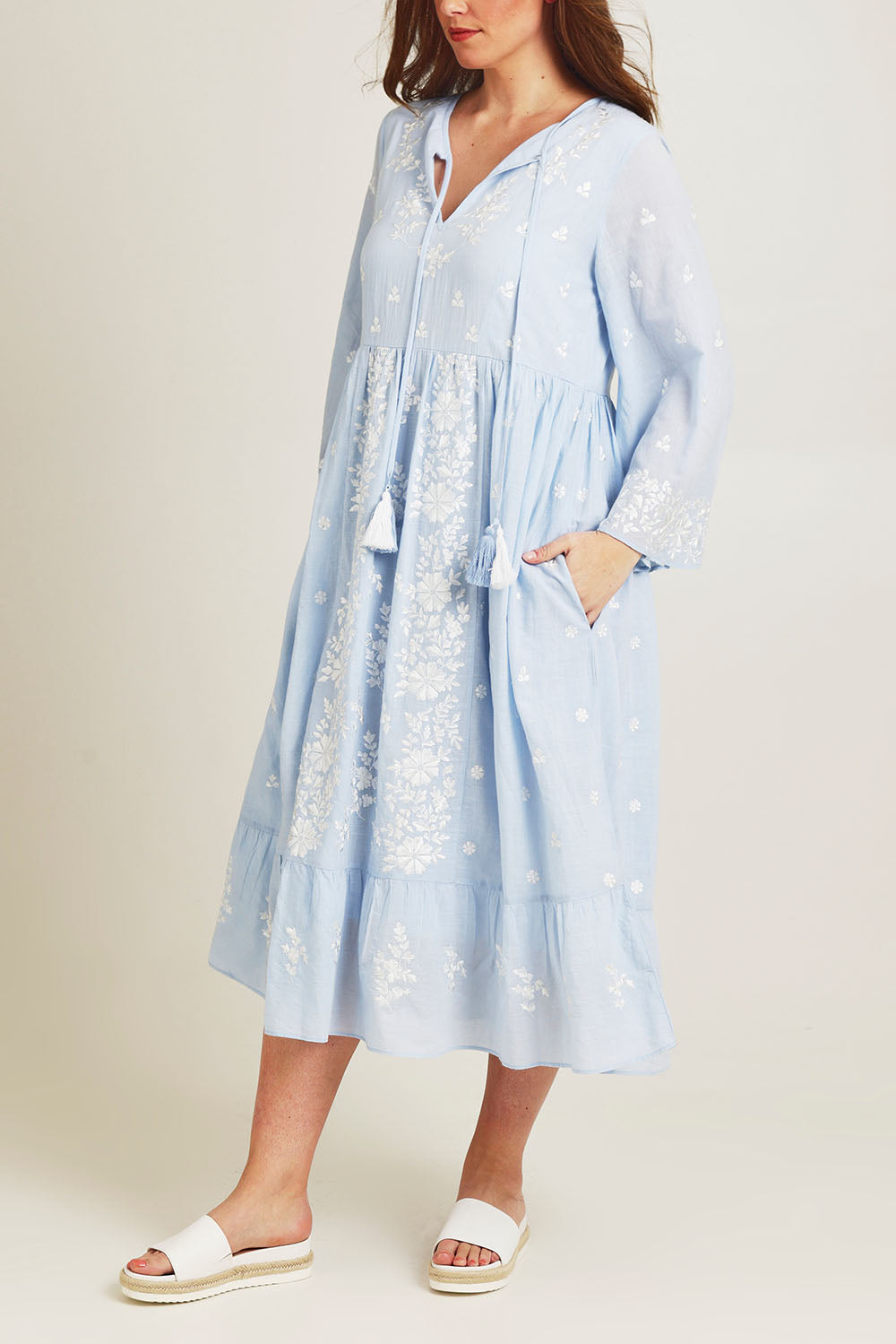 Model Jane wearing size 14 of the Dancing With Joy Dress in colour Skyblue (Blue), from the front, cropped image
