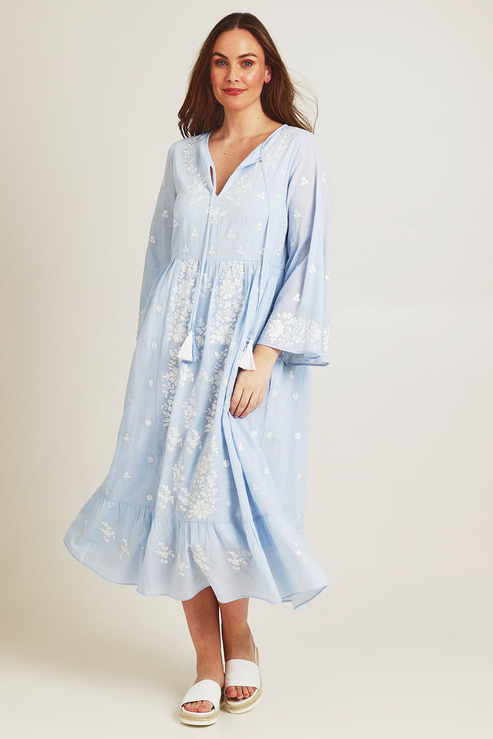 Model Jane wearing size 14 of the Dancing With Joy Dress in colour Skyblue (Blue), from the front, showing the whole outfit