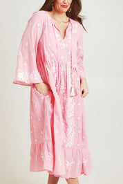 Model Jane wearing size 14 of the Dancing With Joy Dress in colour Strawberry (Pink), from the front, cropped image