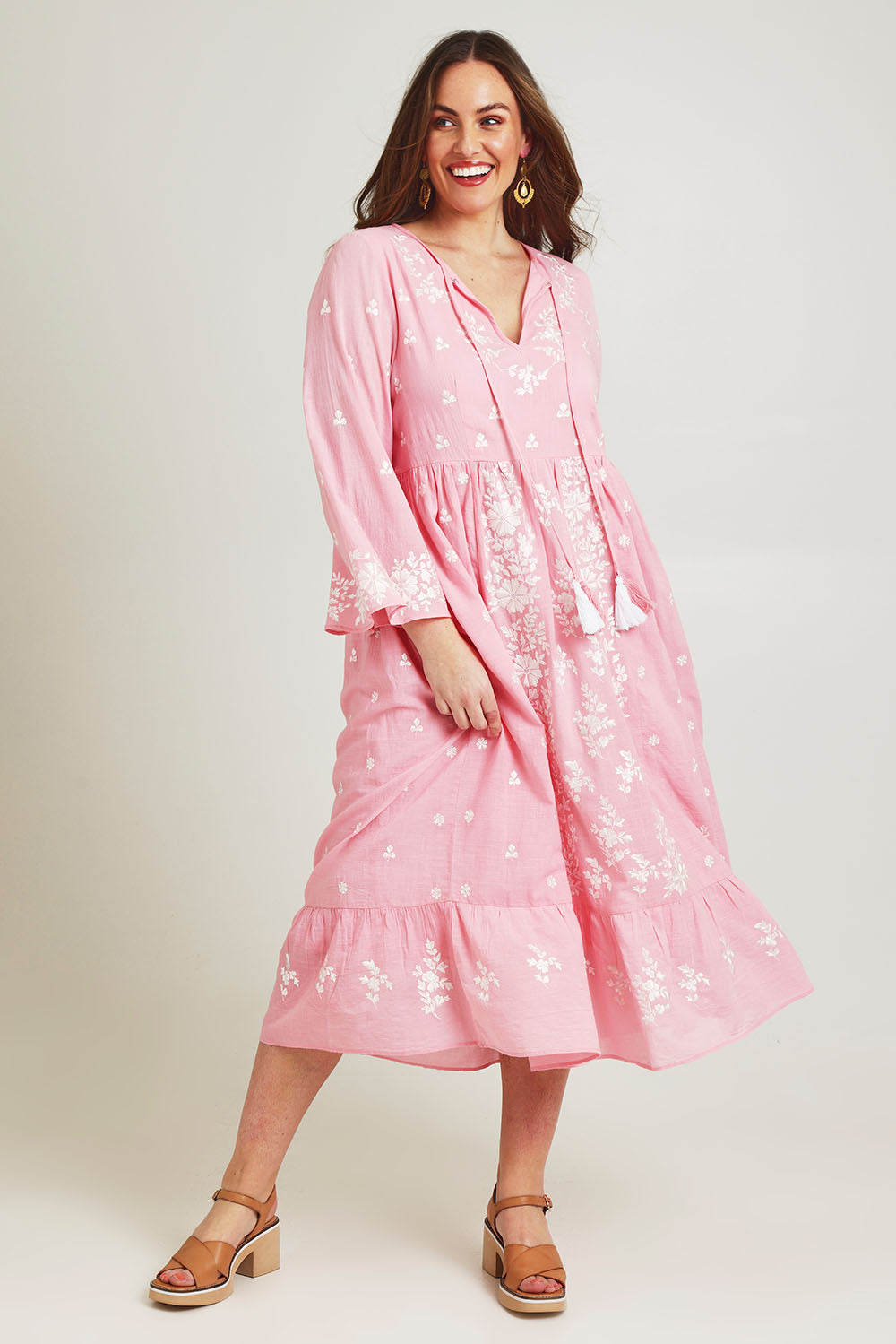 Model Jane wearing size 14 of the Dancing With Joy Dress in colour Strawberry (Pink), from the front, showing the whole outfit