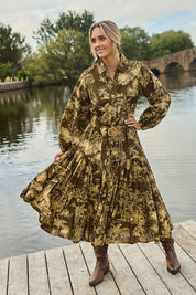 Model Tegan wearing size 10 of the Happy Gatherings Dress in colour Toile (Green), from the front, showing the whole outfit