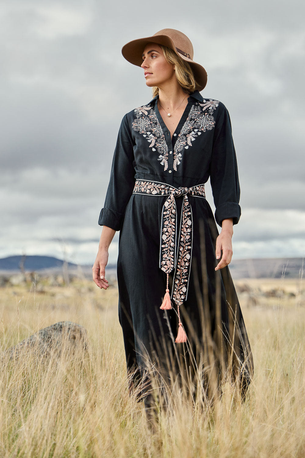 Model Tegan wearing size 10 of the State Of Grace Maxi Dress in colour Black (Black), from the front, showing the whole outfit