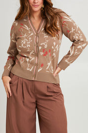 Model Laura wearing size L of the Fleur Delight Trim Cardi in colour Chocfleur, from the front, cropped image