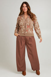 Model Laura wearing size L of the Fleur Delight Trim Cardi in colour Chocfleur, from the front, showing the whole outfit