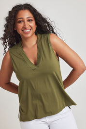 Model Terri-Leigh wearing size 14 of the Bamboo Delight Tank in colour Foliage (Green), from the front, cropped image