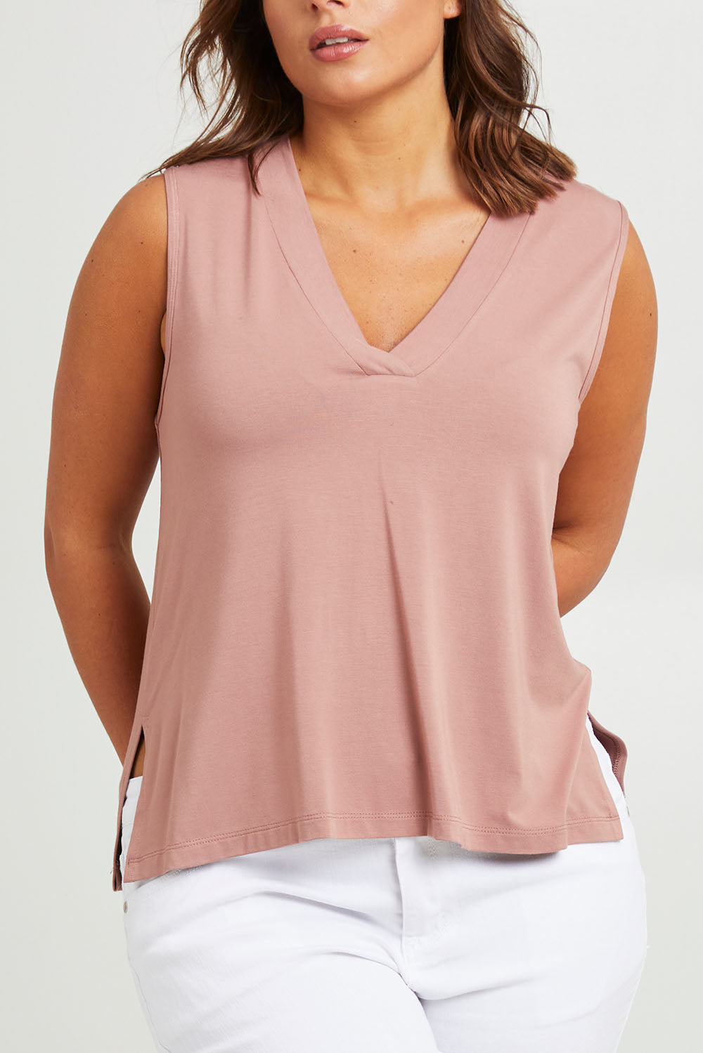 Model Monique wearing size 14 of the Bamboo Delight Tank in colour Mumbai, from the front, cropped image