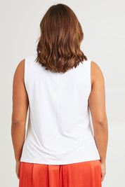 Model Monique wearing size 14 of the Bamboo Delight Tank in colour Vanilla, from the back