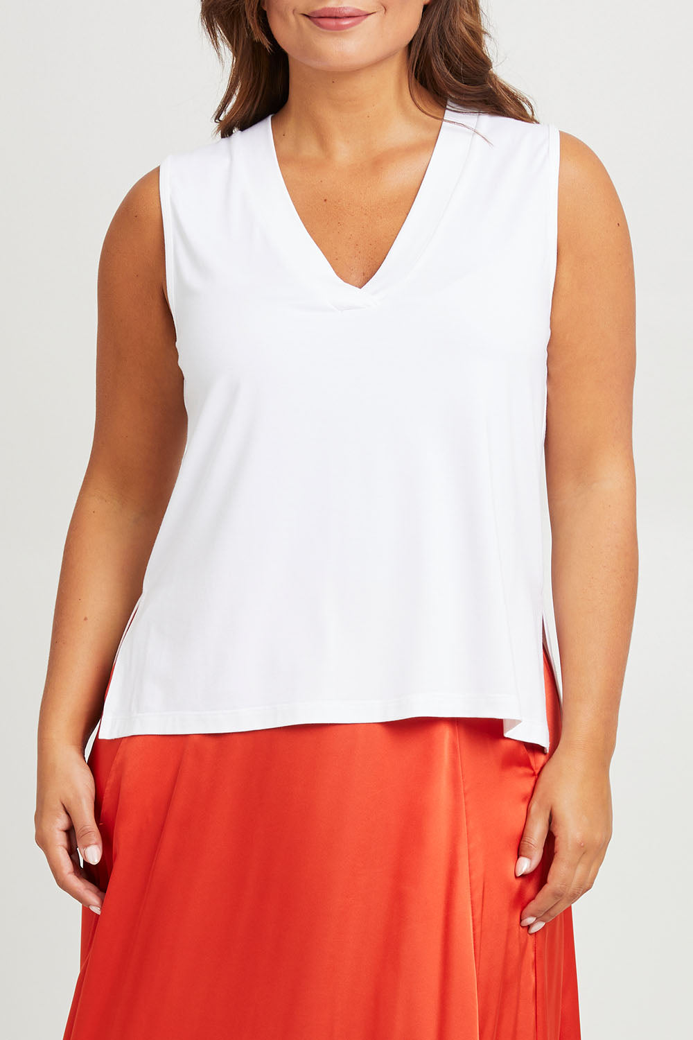 Model Monique wearing size 14 of the Bamboo Delight Tank in colour Vanilla, from the front, cropped image