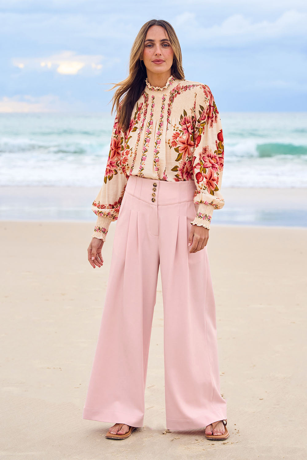 Model Tegan wearing size 10 of the High Flying Wide Leg Pants in colour Palepink (Pink), from the front, showing the whole outfit