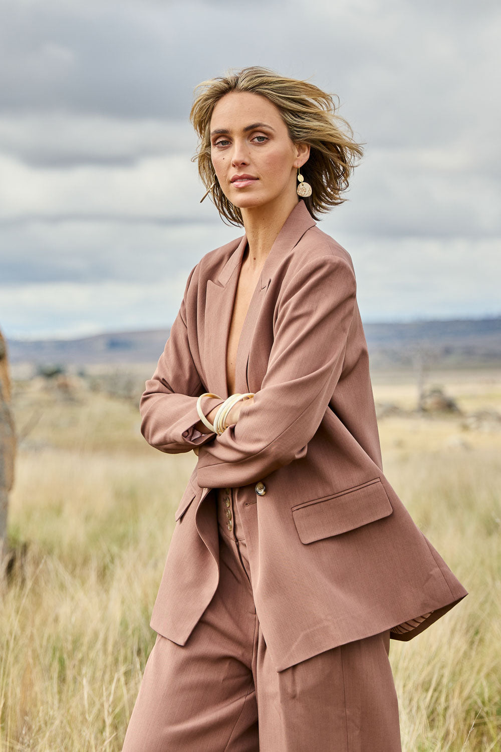 Model Tegan wearing size 10 of the High Flying Oversized Blazer in colour Walnut, from the front, showing the whole outfit