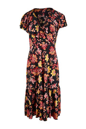 Product shot of The Frill You Give Me Dress in colour Blkfleur (Black), from the front