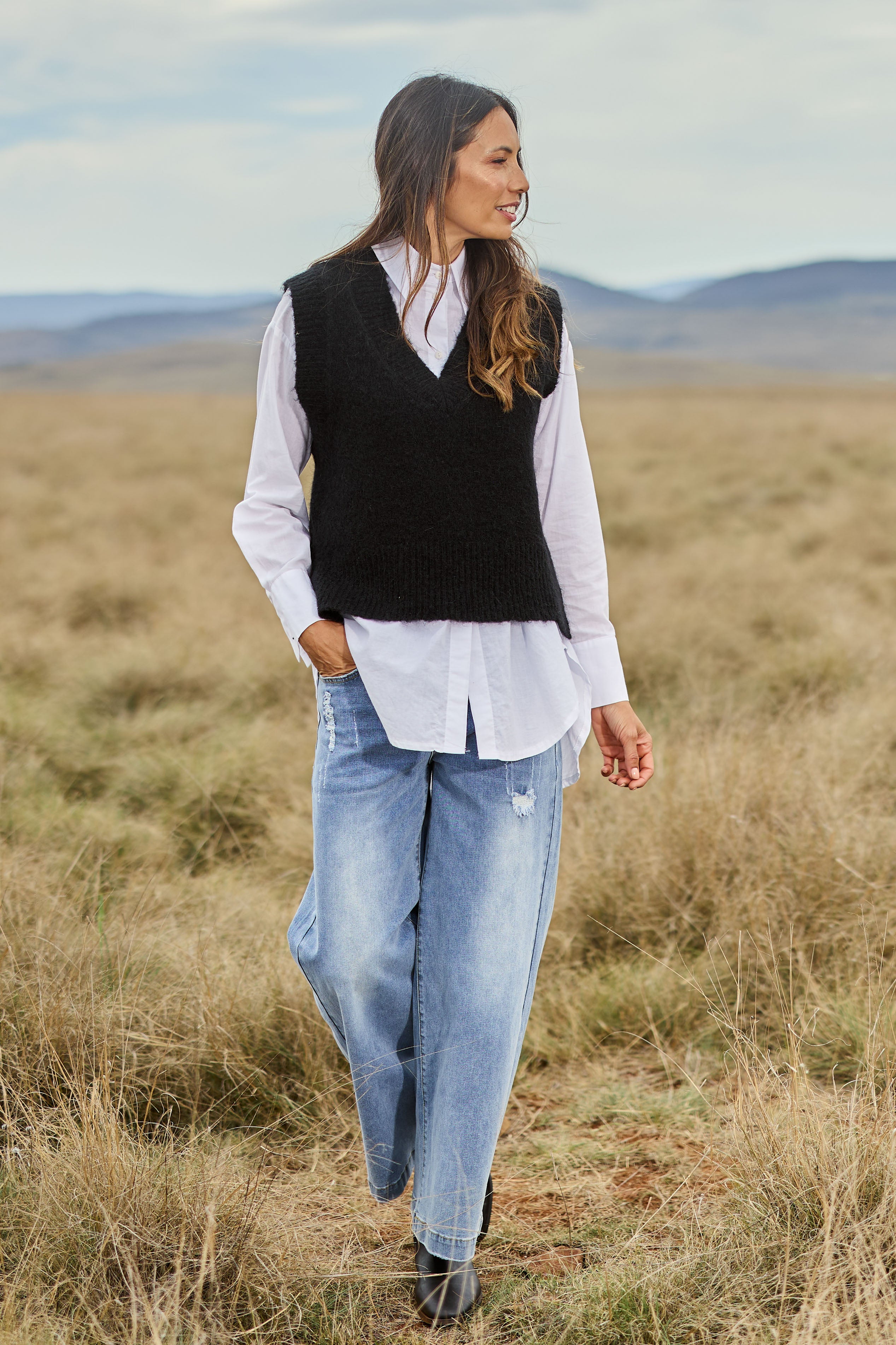 Model Amanda wearing size S of the Lovely Day Vest in colour Black (Black), from the front, showing the whole outfit