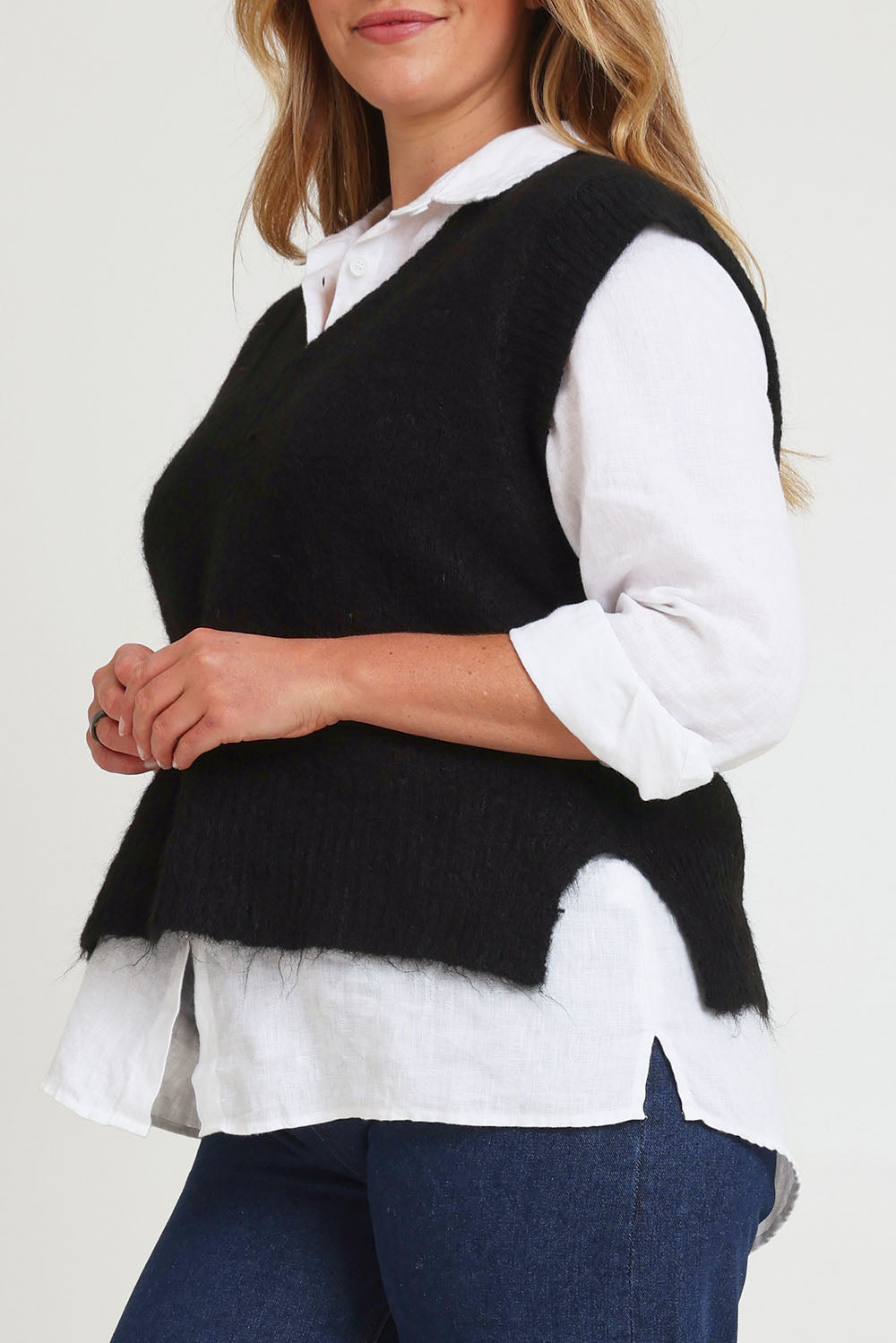 Model Chanel wearing size XL of the Lovely Day Vest in colour Black (Black), from the front, cropped image