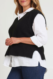 Model Chanel wearing size XL of the Lovely Day Vest in colour Black (Black), from the front, cropped image