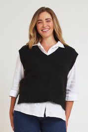 Model Chanel wearing size XL of the Lovely Day Vest in colour Black (Black), from the front, cropped image