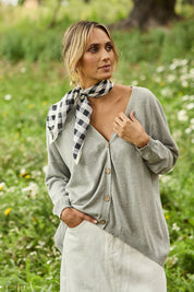 Model Tegan wearing size S of the My Boyfriends Cotton Cashmere Cardi in colour Smoke (Grey), from the front, showing the whole outfit