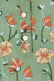 Product shot of the Flower Chain Slouch Top in colour Leaf (Green), detail