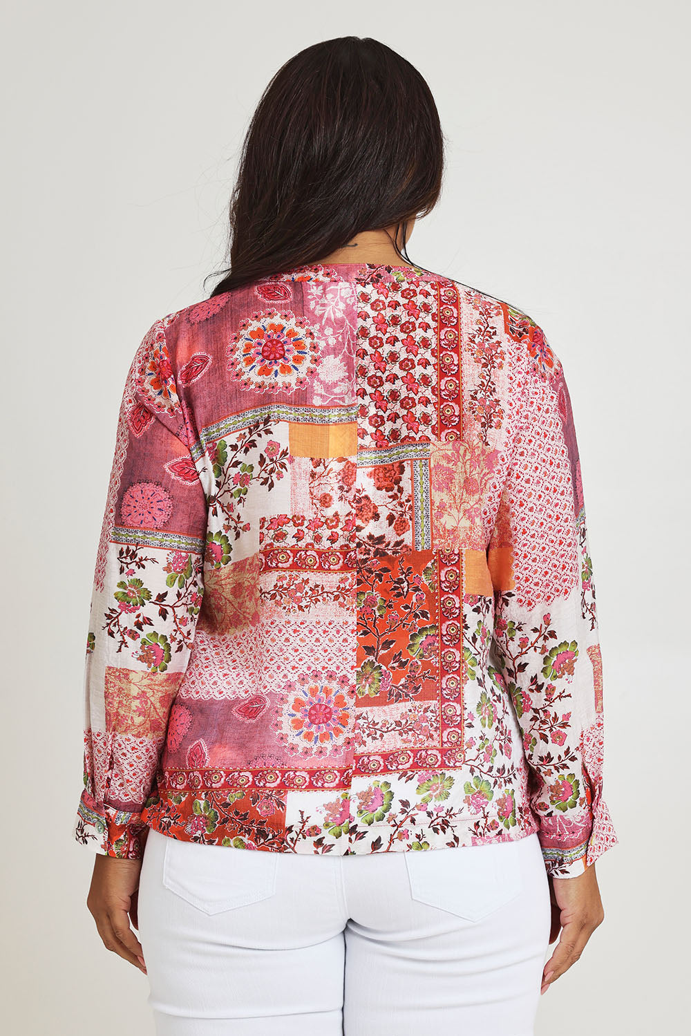 Model Ashleigh wearing size 16 of the Grandpa And Me Fleur Blouse in colour Pinkpatch (Pink), from the front, cropped image