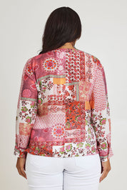 Model Ashleigh wearing size 16 of the Grandpa And Me Fleur Blouse in colour Pinkpatch (Pink), from the front, cropped image
