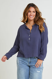 Model Laura wearing size 14 of the Grandpa And Me Cotton Blouse in colour Denim (Blue), from the front, cropped image