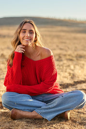 Model Tegan wearing size S of the Ready And Cable Jumper in colour Firecraker (Red), from the front, showing the whole outfit