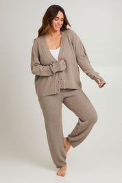 Model Laura wearing size L of the My Boyfriends Moss Stitch Cardi in colour Gumnut, from the front, showing the whole outfit