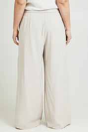 Model Jane wearing size 14 of the Striding Out Wide Leg Pants in colour Moet, from the back