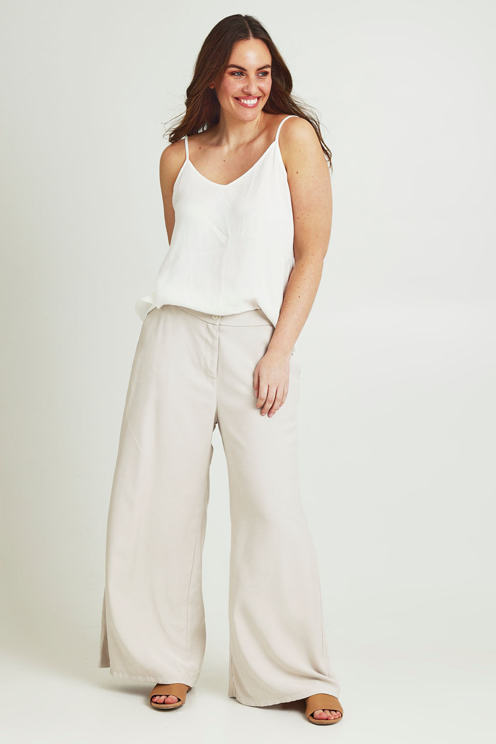Model Jane wearing size 14 of the Striding Out Wide Leg Pants in colour Moet, from the front, showing the whole outfit