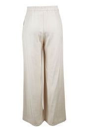 Product shot of the Striding Out Wide Leg Pants in colour Moet, from the back
