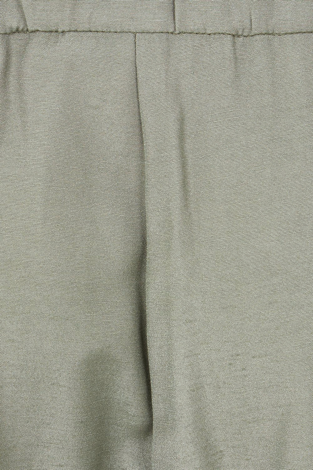 Product shot of the Striding Out Wide Leg Pants in colour Thyme (Green), detail