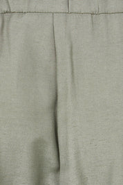 Product shot of the Striding Out Wide Leg Pants in colour Thyme (Green), detail