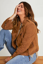 Model Laura wearing size 14 of the Come As You Are Suede Jacket in colour Tan, from the front, cropped image