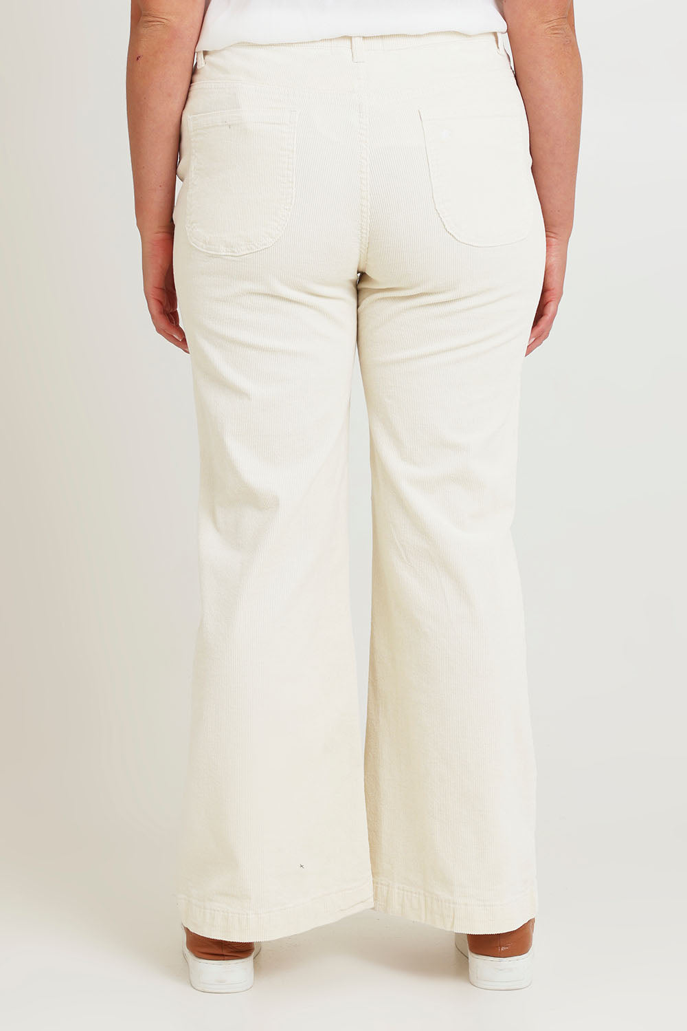 Model Chanel wearing size 16 of the Forever Cool Cord Jeans in colour Milk (White), from the back