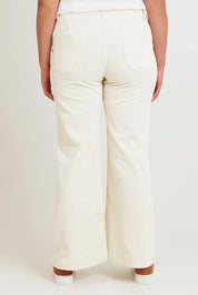 Model Chanel wearing size 16 of the Forever Cool Cord Jeans in colour Milk (White), from the back