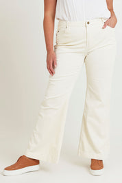 Model Chanel wearing size 16 of the Forever Cool Cord Jeans in colour Milk (White), from the front, cropped image