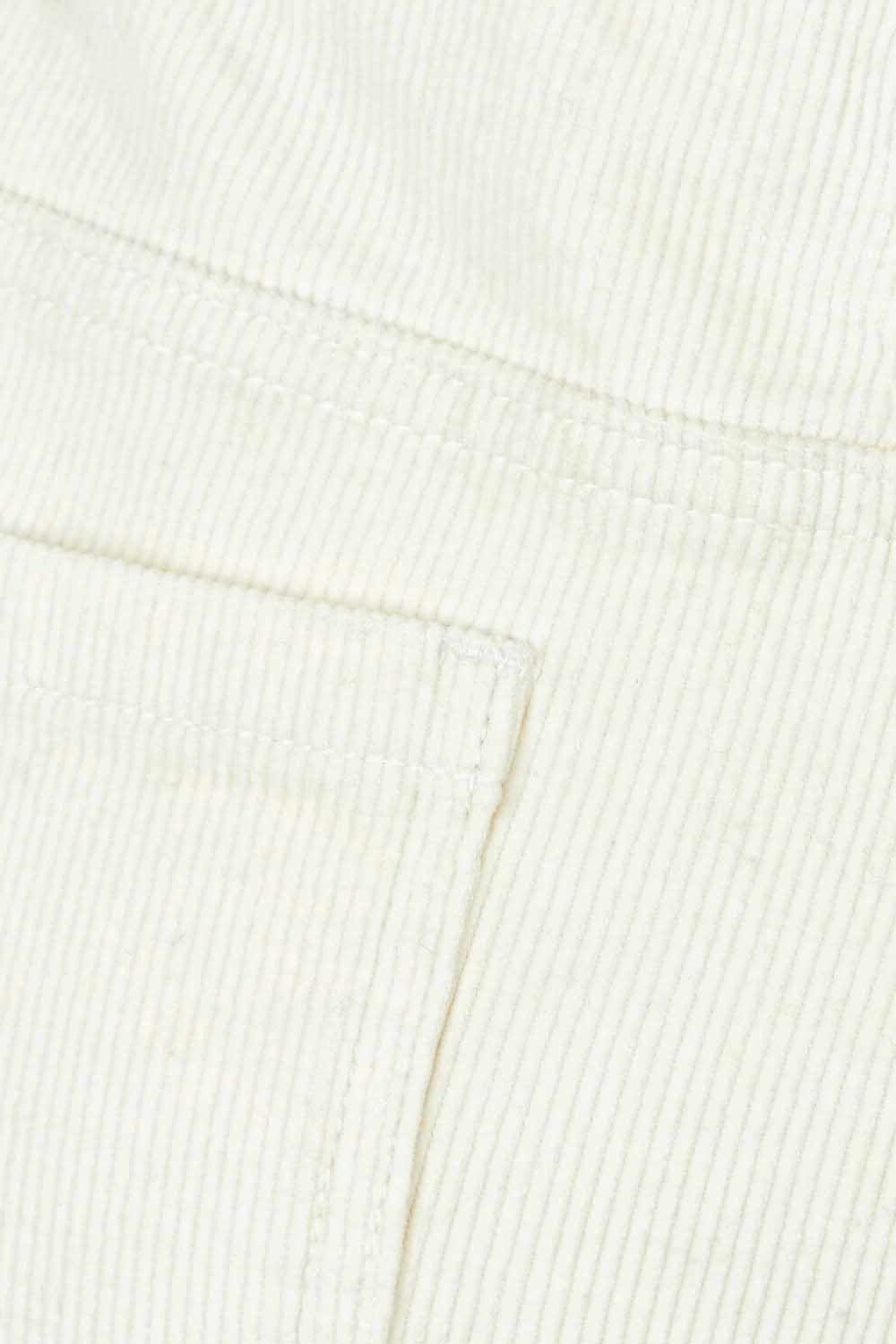 Product shot of the Forever Cool Cord Jeans in colour Milk (White), detail