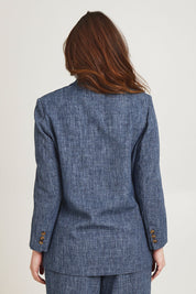 Model Jane wearing size 14 of the Blazing Trails Blazer in colour Duskblue (Blue), from the back