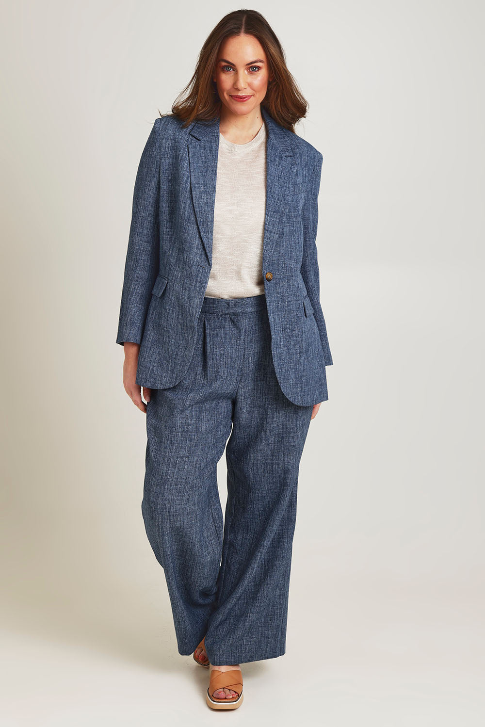 Model Jane wearing size 14 of the Blazing Trails Blazer in colour Duskblue (Blue), from the front, showing the whole outfit