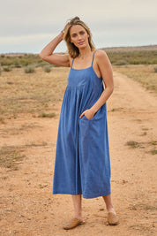 Model Tegan wearing size 10 of the Feels Like Sunshine Cotton Dress in colour Dutchblue (Blue), from the front, showing the whole outfit