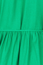 Product shot of the Lunch With The Girls Wrap Dress in colour Emerald (Green), detail