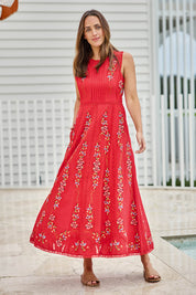 Model Tegand wearing size 10 of the Fleur Muse Embroidered Dress – Red in colour Red, from the front