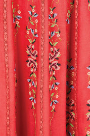 Product shot of the Fleur Muse Embroidered Dress – Red in colour Red, showing detail