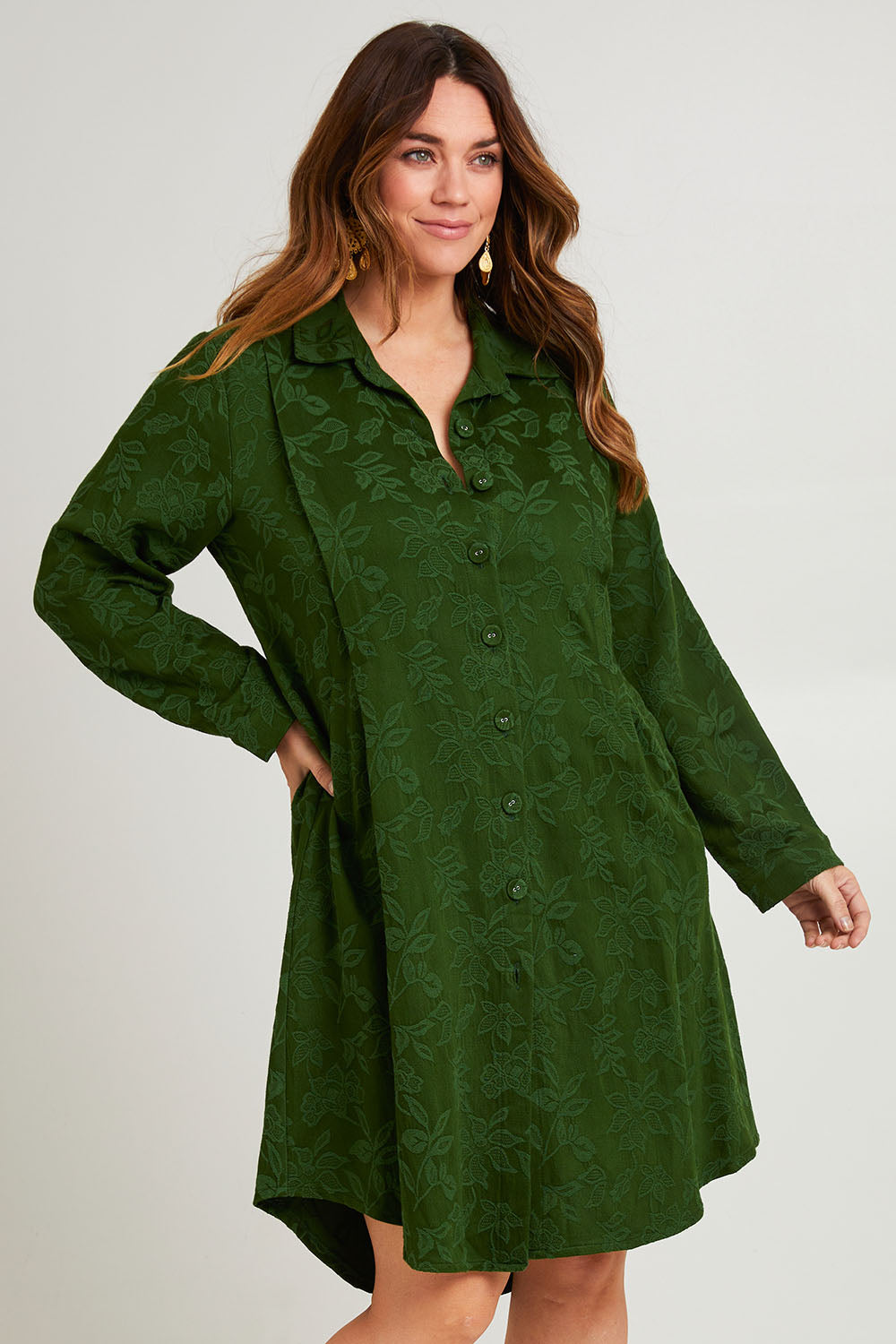 Model Laura wearing size 14 of the Day To Night Jacket To Dress in colour Forest (Green), from the front, cropped image