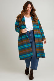 Model Laura wearing size 14 of the Check Me Out Coat in colour Tealcheck (Blue), from the front, showing the whole outfit